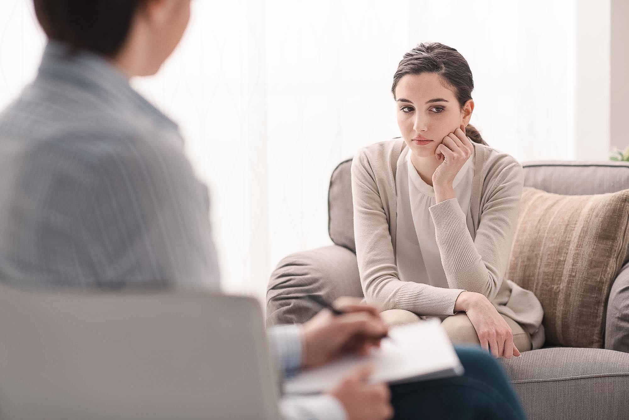 Psychologist listening to her patient