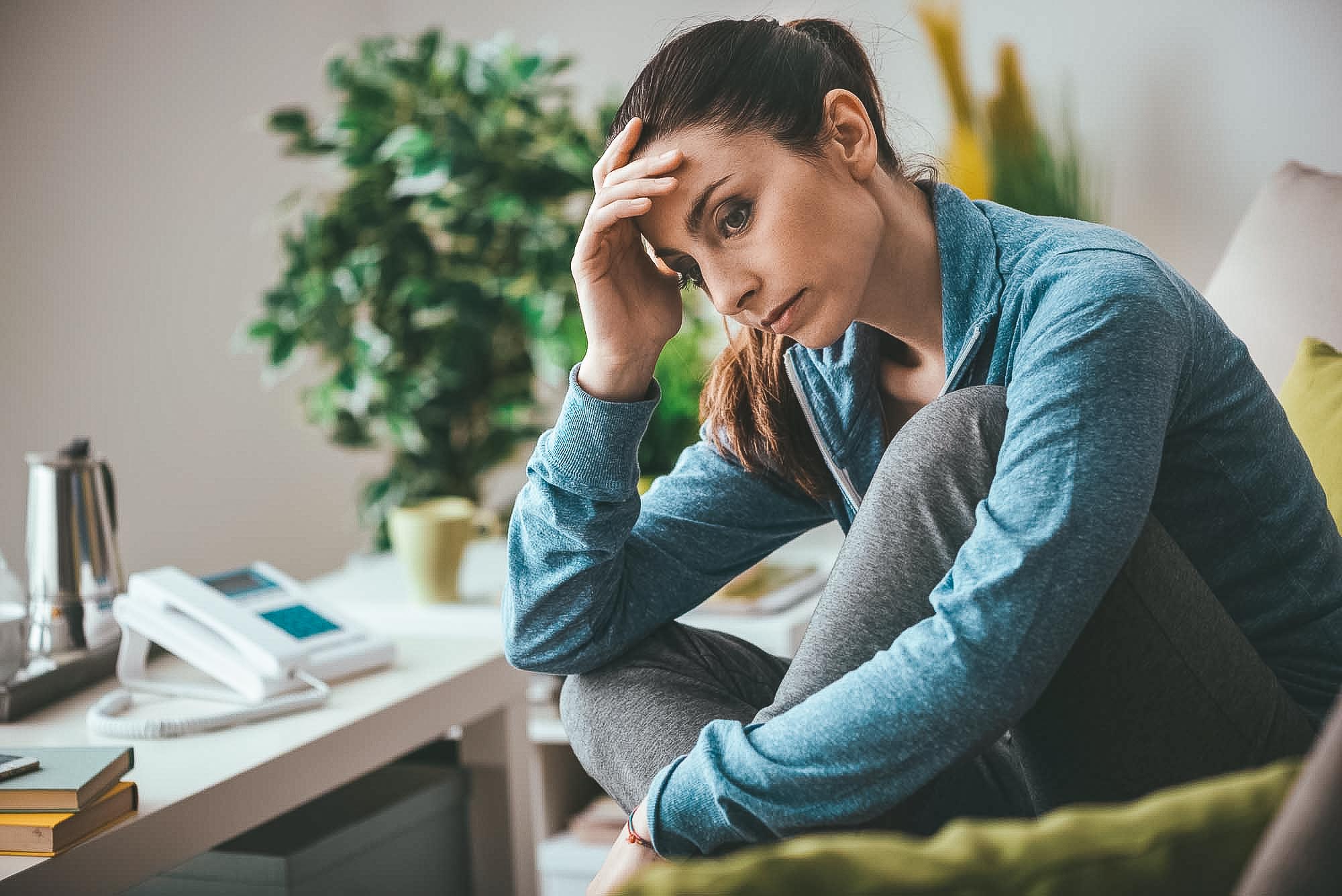 Depressed woman at home
